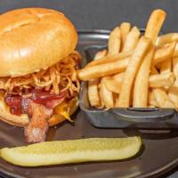 Western Burger · 8 oz burger with Cheddar cheese, bacon, BBQ sauce and grilled onion straws served on brioche...