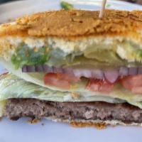 Cali Burger · 8 oz beef or veggie patty served with Swiss cheese, avocado, red onion, tomato and sprouts o...