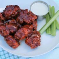 20 Boneless  Nugs · 20 boneless wings, breaded and tossed in one of our signature sauces. Served with celery, an...