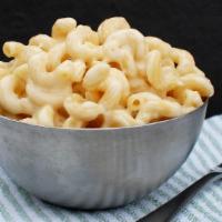 White Cheddar Mac & Cheese · Thick spiral pasta smothered in a white cheddar cheese sauce.