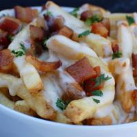 Bacon Cheese Fries · Hand cut fries, smothered in white cheddar cheese sauce, topped with thick-cut slow roasted ...