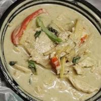 Green Curry · Green curry paste, coconut milk, bell peppers, carrots, bamboo shoots, green bean and basil.