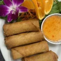 Crispy Roll · Crispy vegetable spring rolls. Served with sweet and sour sauce.
