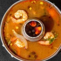 Tom Yum · Thailand's famous hot and sour soup with lemongrass, tomatoes, onions, mushroom and cilantro...