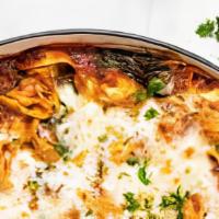 Baked Tortellini · Cheese filled tortellini baked in marinara or alfredo sauce and smothered with mozzarella ch...