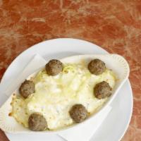 Baked Formaggi · Meatballs layered in alfredo sauce & smothered with mozzarella , parmesan & feta.