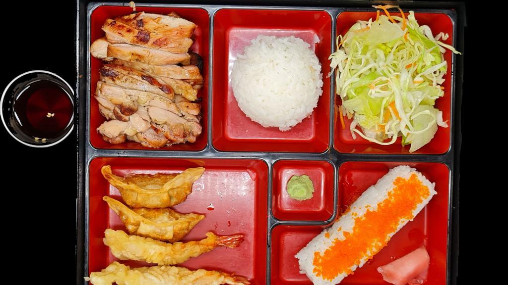 Bento-A · Chicken Teriyaki, Shrimp Tempura (2pcs), Gyoza (3pcs), California roll (4pcs), Steamed rice, and Salad.