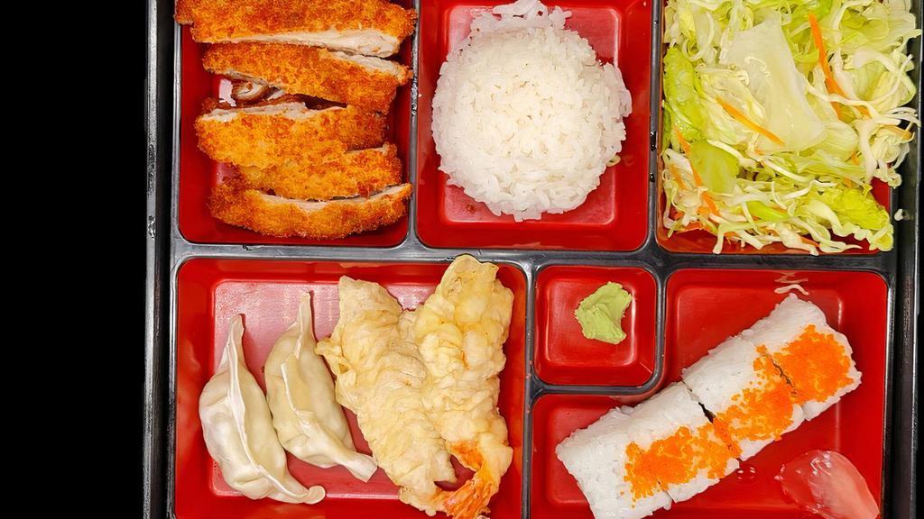 Bento-B · Chicken katsu, Shrimp Tempura (2pcs), Gyoza (3pcs), California roll (4pcs), Steamed rice, and Salad.