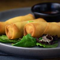 Spring Rolls (3Pc) · 3 vegetable spring rolls served with house sweet and sour sauce.