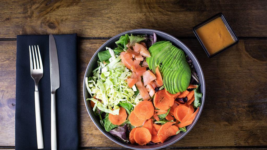 House Salad · Mixed greens, carrots, shredded cabbage topped with house ginger dressing.
