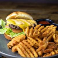 America Burger · American, tomato, lettuce and pickle served on a brioche bun. served with a side of waffle f...
