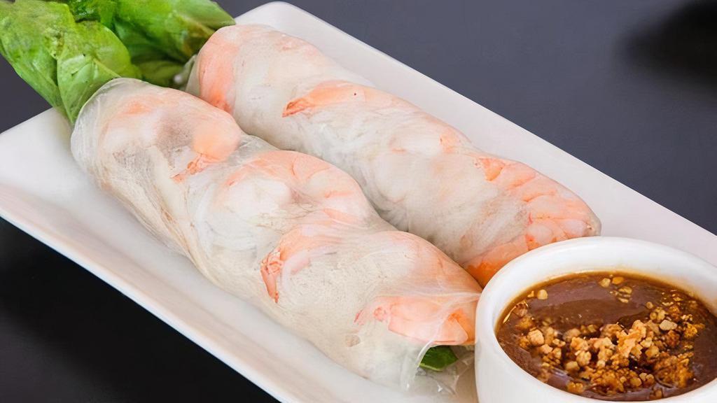 Fresh Spring Rolls- Goi Cuon · Two pieces. Fresh green leaf lettuce, shrimp, pork, vermicelli rolled with rice paper served with house Hoisin peanut sauce.

Some ingredients might be omitted when out of season.