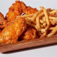 Wing Combo (8) · 8 bone-in chicken wings with your choice of sauce. Served with a side of fries.