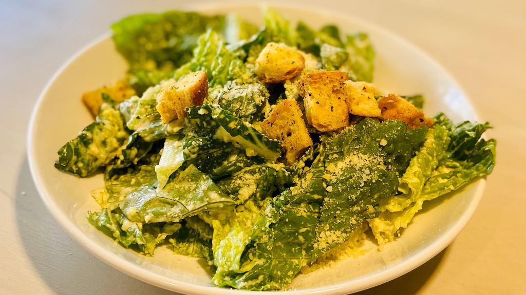 Logan Street Caesar · Roasted garlic- lemon dressing, parmigiano, grilled croutons.

Can be made GF without croutons.