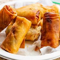 Crispy Egg Rolls (Cha Gio) · Marinated pork and shredded carrots rolled in a crispy shell and served with a house made pe...