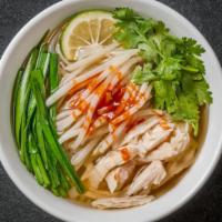 Grilled Chicken Pho (Pho Ga Nuong) · Hearty grilled chicken, rice noodles, cilantro, basil, and sliced onions served in a savory ...
