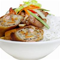 3 Item Combo Rice (Come 3 Mon) · 2 crispy egg rolls, grilled pork, and 3 grilled shrimp served over a bed of steamed rice.