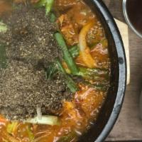 Gamja Tang · Spicy. 14 hour slow cooked pork backbone stew with vegetables.