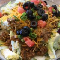 Taco Salad · Light yet filling! a bowl of green crisp green mix filled with lots of yummy taco beef spice...