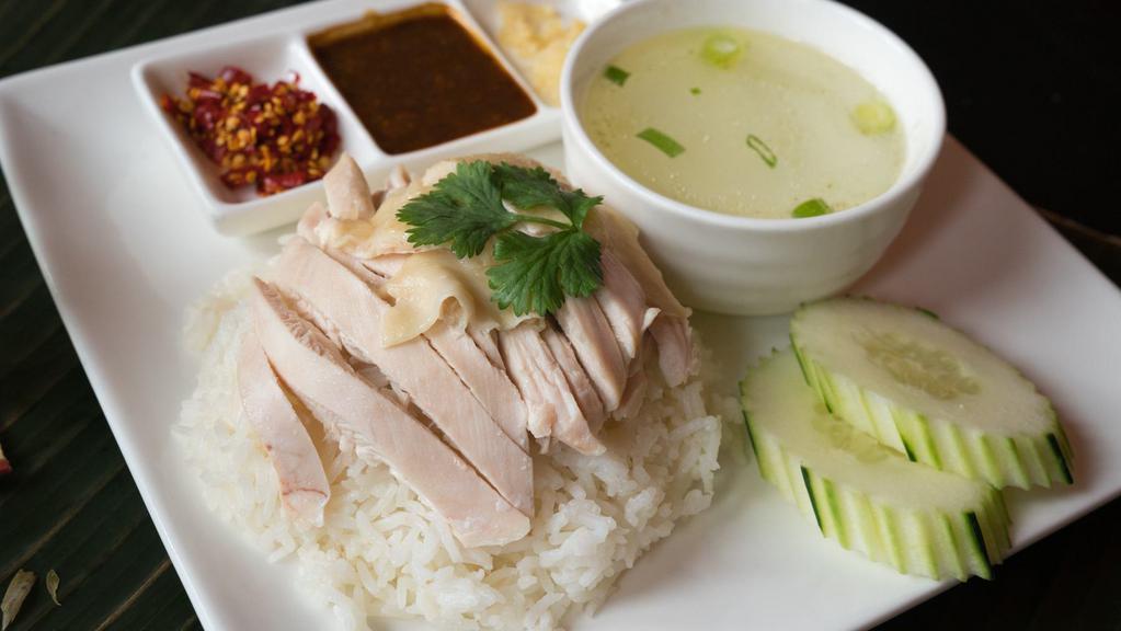 Khao Mun Gai · Poached chicken, fragrant rice, winter melon soup, homemade ginger soy bean sauce.