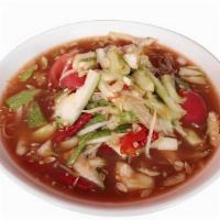 Thum Tang · Cucumbers, tomatoes, fresh chilies, crushed peanuts in fish sauce vinaigrette. Gluten free. ...