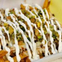 Carne Asada Fries · Awesome dish turned into a house favorite.