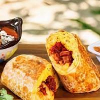 Build Your Own Burrito · Eggs with your choice of meat and toppings.
