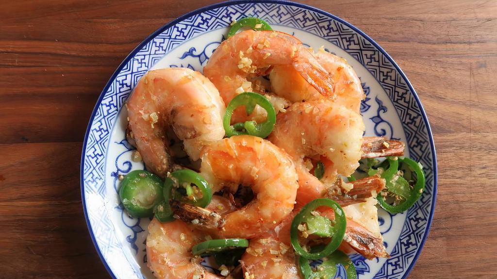 Salt & Pepper Shrimp · Spicy. Deeply fried shrimps sautéed with sprinkled pepper, diced onions, garlic, and ginger.