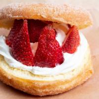 Strawberry Split Donut (Vegan) · Our Large Vegan Yeast Ring Coated in Cinnamon Sugar and filled with Fresh Whipped Non-Dairy ...