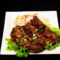 Thịt Bò Nướng · 1 pound of grilled marinated short ribs