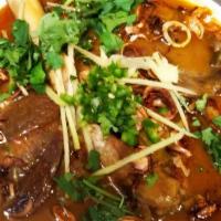 Lamb Nihari · Slow cooked lamb shank stew in traditional spices. One of most delicious dish.
