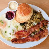 Rodger · Two cage-free eggs, Daily’s bacon, quinoa potato hash, house biscuit.