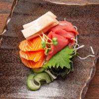 Sashimi · Seven pieces of assorted fish.