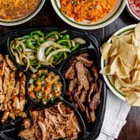 Fajita Taco Platter Pack · Includes: Grilled Chicken, Grilled Steak, Carnitas, Grilled Chilies & Onions, Pico de Gallo ...