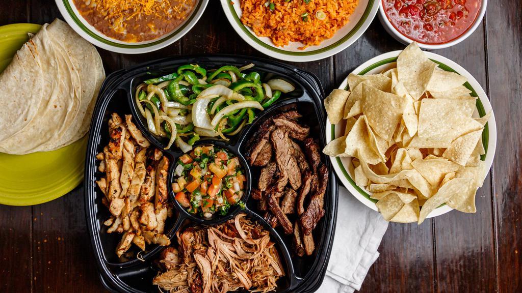 Fajita Taco Platter Pack · Includes: Grilled Chicken, Grilled Steak, Carnitas, Grilled Chilies & Onions, Pico de Gallo Salsa & Tortillas. Each Pack Includes: Quart of Rice, Quart Of Beans, Pint of Salsa, 2 Small Chips.