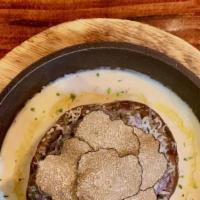 Truffle Gnocchi  · potato gnocchi, mushrooms, asiago cheese, miso alfredo sauce, fresh black truffle, truffle oil