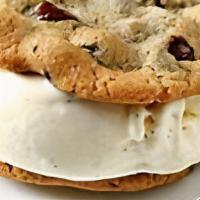Chocolate Chip Cookie Sandwich · A delicious chocolate chip cookie with vanilla ice cream and chocolate chips smothered gener...