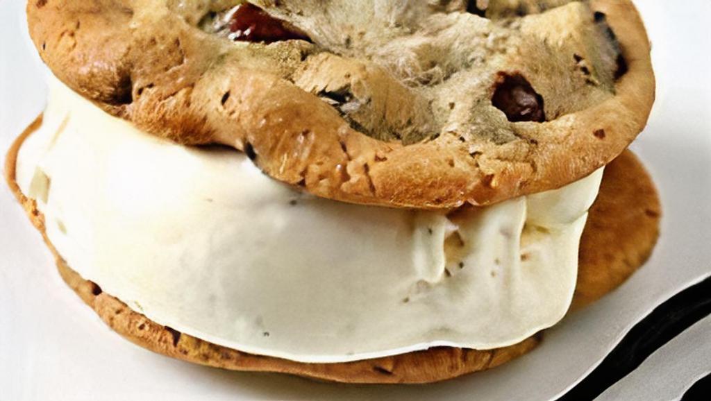 Chocolate Chip Cookie Sandwich · A delicious chocolate chip cookie with vanilla ice cream and chocolate chips smothered generously.