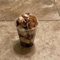 Cookie Dough Sundae · Cookie dough, topped with whip cream, peanuts and a cherry.