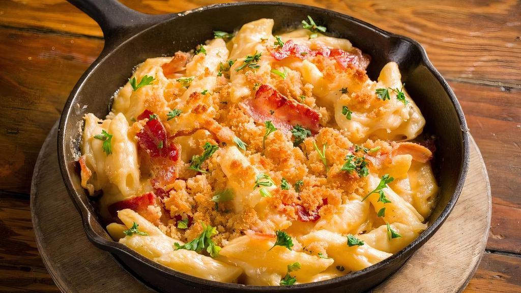 Get Back Mac & Cheese · Bacon, a blend of jack, Cheddar, Romano and Parmesan cheese, cream sauce, penne pasta, parsley, crumbled cracker topping