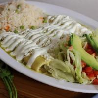 Enchiladas Verdes · Green enchiladas filled with one choice of meat, shrimp, chicken or ground beef.