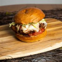 Fried Chicken Parmesan Sandwich · Best of the barnyard- chicken parmesan sandwich topped with mozzarella cheese and marinara s...
