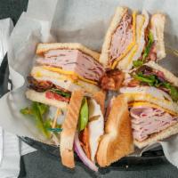 The Club · The Three-tiered classic with Bacon, Ham & Turkey, American Cheese on white or wheat bread w...