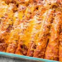 Chicken Enchiladas · Three corn tortillas stuffed with cheese and chicken, and topped with your choice of sauce. ...