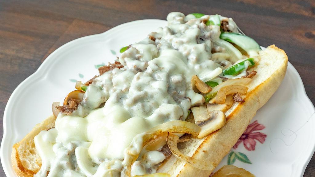 Philly Cheese Steak · Philly Cheese Steak, grilled with onions, bell peppers, mushrooms and topped with provolone cheese