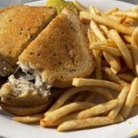 Patty Melt · A patty topped with melted american cheese and sautéed onions, on grilled rye.

*Cooked to y...