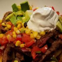 Fajita Bowl · Carne asada, chicken, or shrimp, black beans, cilantro lime rice, peppers and onions, avocad...