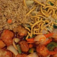 Sweet & Sour Chicken · Deep-fried tender chicken breast meat with green peppers, onion, carrots, pineapple in sweet...
