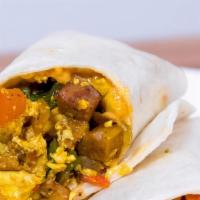 Veggie Breakfast Burrito  · cage free eggs, paprika potatoes, roasted onion, roasted red bell pepper, cheddar cheese and...