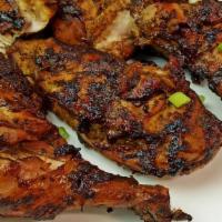 Boneless Grilled Jerk Chicken Plate · Traditional jerk dry-rubbed, grilled to perfection.